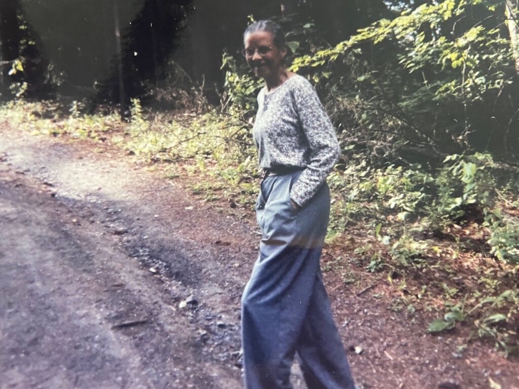 On the Goddard campus path to the library, Meta's mother, all smiles.